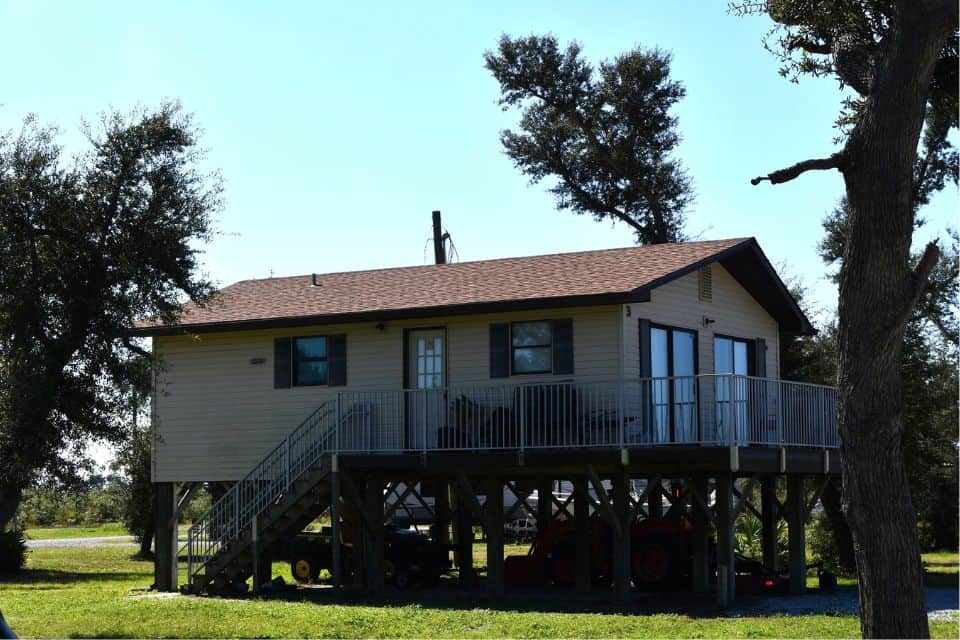 A raised cabin in the woods