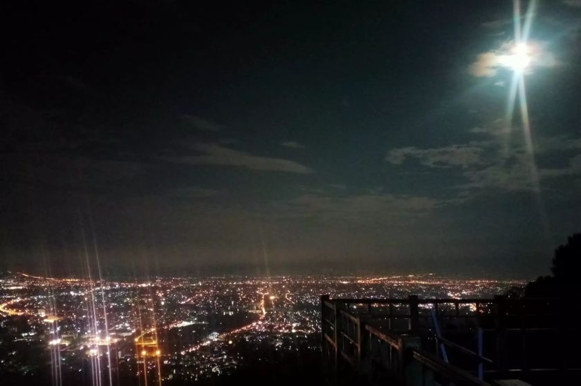 A city at night as seen from a distance